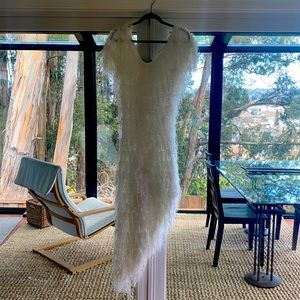 Asymmetrical white custom shag dress.